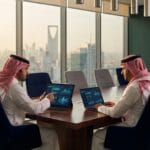 Executive meeting in Riyadh to evaluate software development companies in Saudi Arabia before contracting on a technical project